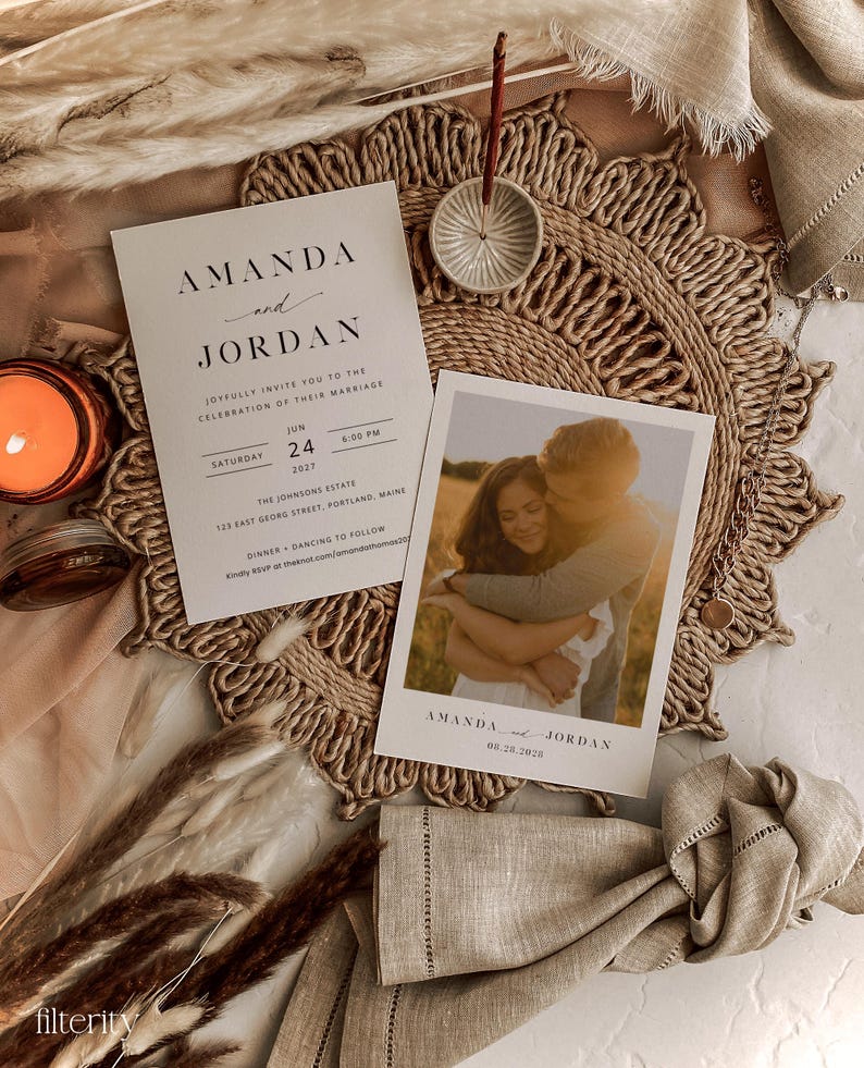May include: A wedding invitation with a rustic theme. The invitation is printed on white cardstock with black text. The invitation includes the names Amanda and Jordan, the date June 24, 2027, and the time 6:00 PM. The invitation also includes the location of the wedding, The Johnsons Estate, 123 East Georg Street, Portland, Maine. The invitation is accompanied by a photograph of the couple.