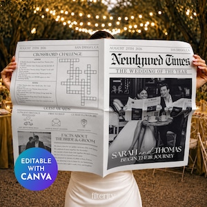 以下が含まれることがあります： 2026年8月25日、サンディエゴ、カリフォルニア州の日付が入った「Newlywed Times」というタイトルのカスタムウェディング新聞。レイアウトにはクロスワードパズル、ゲスト賞、カップルに関する事実、そして新郎新婦が読書をしている白黒写真が含まれています。
