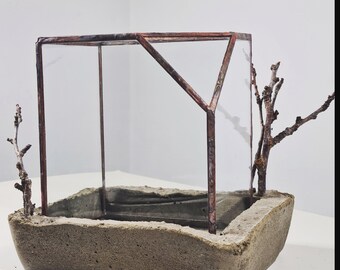 Stained glass terrarium container with copper patina, concrete stand, branches