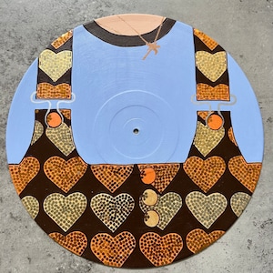 Wembley N2….HSLOT 2023. A recycled vintage vinyl, hand painted with Harry Styles‘ iconic stage outfit
