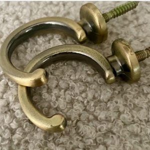 Antique brass curtain tie back hooks x 2