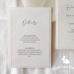 May include: A white card with a textured surface. The card has a black border and the text "Details" in a handwritten font. The text "Description" is followed by the text "You can use this card to add more information for your guests." The text "Examples" is followed by a list of examples of information that can be added to the card, including directions, RSVP, wishing well, accommodations, wedding website, dress code, transportation, and etc.