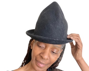 Unique hats, unusual shapes hats ,pointed hats, wool hats, stylish hats, oversized hats, odd shaped , one size ,tall hat ,black hat .