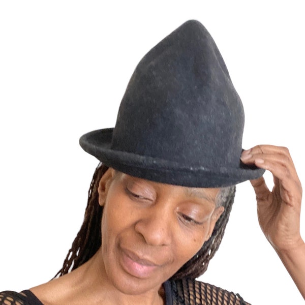 Unique hats, unusual shapes hats ,pointed hats, wool hats, stylish hats, oversized hats, odd shaped , one size ,tall hat ,black hat .