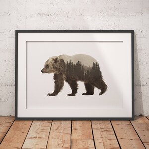 May include: A framed print of a brown bear with a forest scene superimposed over its body. The bear is walking to the right and the forest scene is in shades of brown and green.