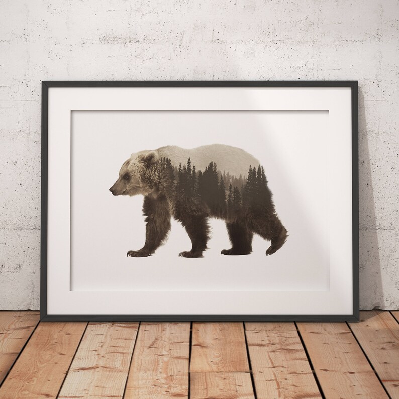 May include: A framed print of a brown bear with a forest scene superimposed over its body. The bear is walking to the right and the forest scene is in shades of brown and green.