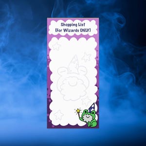 May include: A purple and white shopping list notepad with a cartoon frog wearing a wizard hat and holding a magic wand. The notepad has a cloud-shaped space for writing with stars in the background. The text on the notepad reads "Shopping List (For Wizards ONLY)"