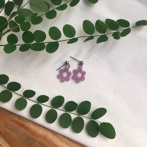 Beaded Flower Dangle Earrings in Lilac and White | Dainty Floral Hand Beaded Earrings | Handmade Holiday Gift Jewelry | Queer Owned