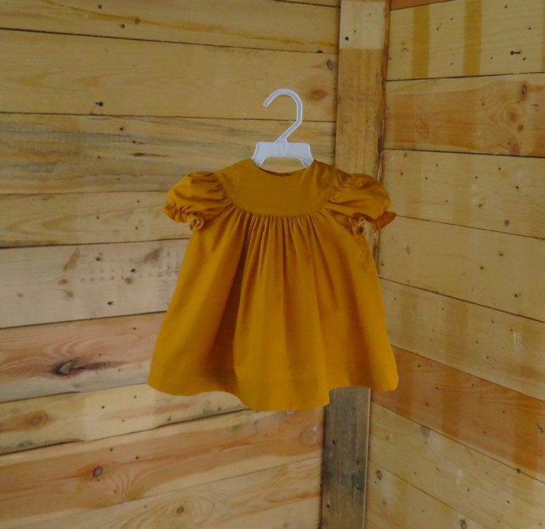 mustard baby dress