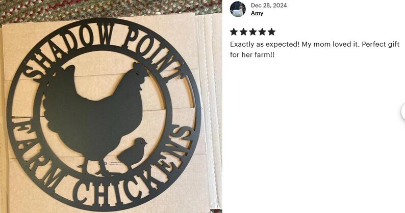 May include: Black metal sign with the text "Shadow Point Farm Chickens" in a circle. A silhouette of a hen and a chick are in the center of the circle.