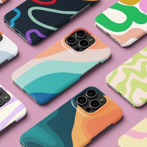 May include: Assortment of colorful phone cases with abstract designs. The cases feature various patterns, including wavy lines, swirls, and geometric shapes. The cases are designed for a smartphone with a triple camera lens.