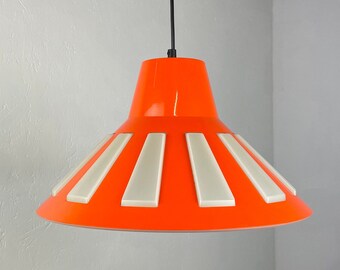 May include: Orange and white pendant light with a wide, cone-shaped shade. The shade has white vertical stripes.