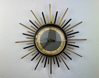 Vintage 1960s sunburst clock - Orfac Germany - silent time - electric 220 volts - brass metal