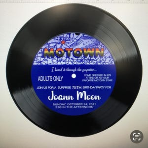May include: A black vinyl record with a blue and gold label featuring the word "MOTOWN". The label includes the text "I heard it through the grapevine..." and invites guests to a 75th birthday party for Joann Moon.