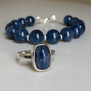 Stunning Kyanite Ring bezel set in sterling silver. Genuine high grade kyanite gemstone Size 8 US R71