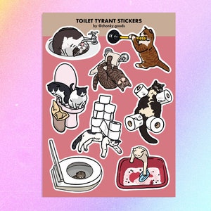 Stickervel toilettiran kat meme – sticker kat meme, chaotische kattenmeme, vervloekte kat, grappige kat meme sticker, kattenkak badkamerhumor