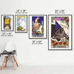 May include: A set of 4 cat tarot cards with black frames. The cards are 30.5 cm by 40.6 cm, 30.5 cm by 45.7 cm, 45.7 cm by 61 cm, and 61 cm by 91.4 cm. The cards feature illustrations of cats in various poses, with the names of the cards written below each image. The cards are printed on high-quality paper and are perfect for any cat lover.