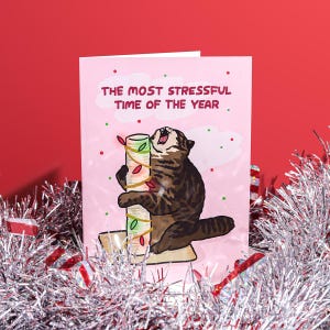 Época mais estressante do ano Grito de gato de poste Natal, boas festas gato, cartão engraçado de Natal gato, meme engraçado de gato cartão de Natal