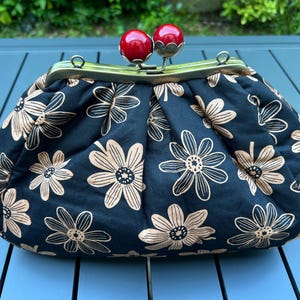 Pasticcino Clutch Bag Clic clac in metallo handbag clic-clac handle