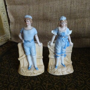 Victorian bisque bathing costume ceramic figures