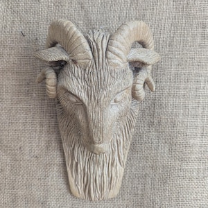 Stoneware pottery ram head wall plaque statue