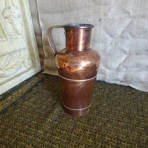 Antique copper water jug