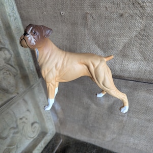 Vintage Royal Daulton ceramic sculpture of a Boxer dog.