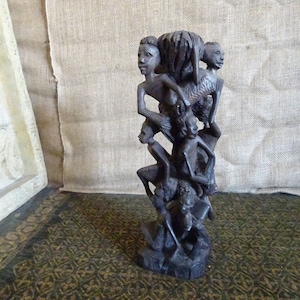 Ebony wood tree of life unity Makonde Tribe. Tanzania tribal carving