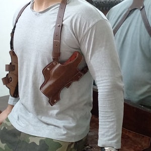 Zweifach positioniert, wunderschön handgefertigt für Taurus, Beretta, Glock, Hi Point und alle 9 mm & .45 Cal Feuerwaffen mit hochwertigem Leder und Design.