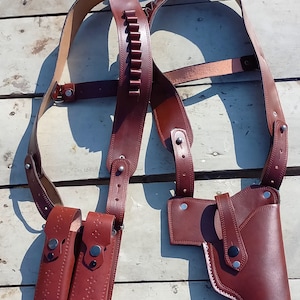 Exclusive vert/horizontal designed for Taurus, beretta,Glock,Hi point and all 9mm & .45 cal firearms with quality leather and design.