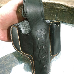 Aesthetic Handcrafted clip holster for 9mm, made from exquisite quality leather..