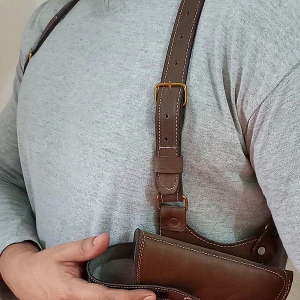 Incredible Handcrafted holster for Taurus, beretta,Glock,Hi point and all 9mm & .45 cal with quality leather and design.