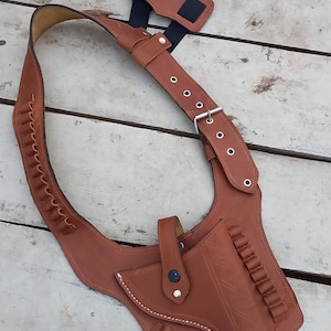 Impressive beautifully crafted Leather universal rig for revolvers i.e Colt, Taurus, Smith and Wesson,quality with feasibility Guaranteed