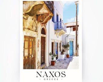 May include: A print featuring a narrow street scene in Naxos, Greece. The image showcases white buildings with blue accents, wooden doors, and potted plants. The text "NAXOS - GREECE -" is at the bottom of the print.
