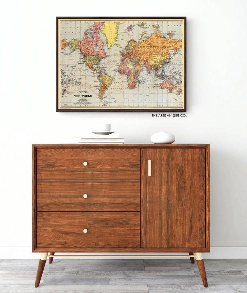 Cavallini World Map colorful Poster in Vintage style in a living room setting.