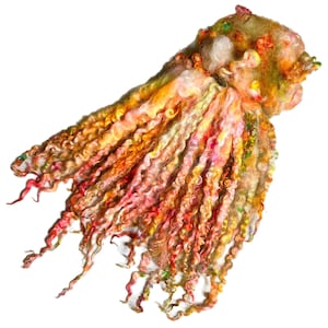 May include: A colorful, curly, hand-spun yarn with shades of pink, orange, yellow, and green. The yarn is arranged in a loose bundle, with the ends of the strands flowing out.