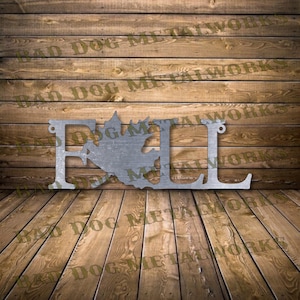 May include: Metal wall decor featuring the word "FALL" with a stylized leaf design in the center. The letters are silver and the leaf is a darker silver.