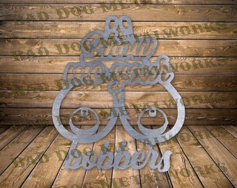 May include: A metal sign with the words "60 Now You Know" and "Doppers" in a decorative font. The sign is shaped like two large, stylized eyes.