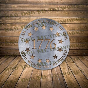 May include: A silver metal circle with the text "I am the descendant of men who would not be ruled" and "1776" surrounded by stars.