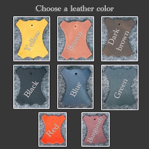 May include: Nine leather swatches in different colors: yellow, brown, dark brown, black, blue, green, red, burgundy. Choose a leather color.