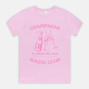 Pink Champagne Social Club T-Shirt – Trendy Champagne Cocktail Lover Tee for Brunch Bachelorette Parties, & Celebrations Bella Canvas Tee