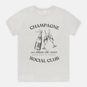 Champagne Social Club T-Shirt – Trendy Champagne Cocktail Lover Tee Perfect for Brunch Bachelorette Parties, & Celebrations Bella Canvas Tee