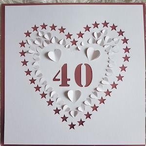 40 SVG cutting file with pop up hearts and cut out stars.