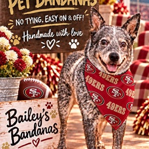 May include: A blue heeler dog wearing a red triangular pet bandana featuring the San Francisco 49ers logo and text. The bandana is displayed in front of a wooden sign with the text SNAP-ON PET BANDANAS, NO TYING. EASY ON & OFF!, and Bailey's Bandanas.