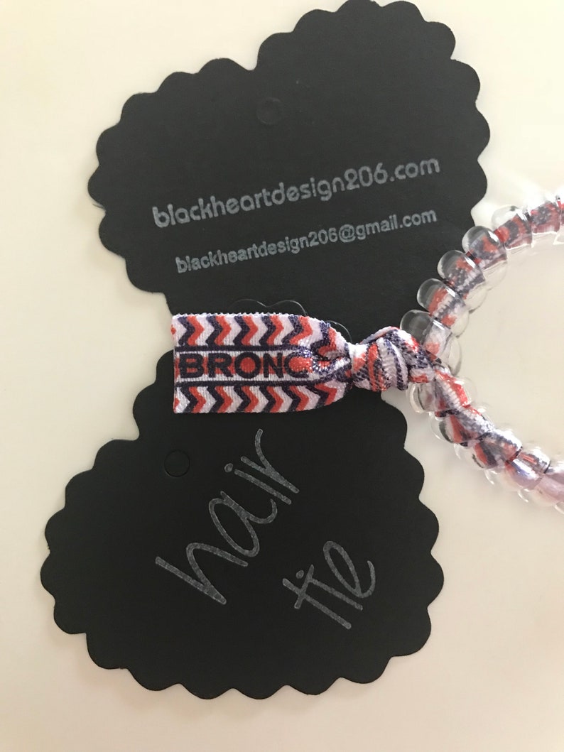 Denver Broncos football Secure sports hair tie hair cord hair elastic for all pony tail types messy buns.