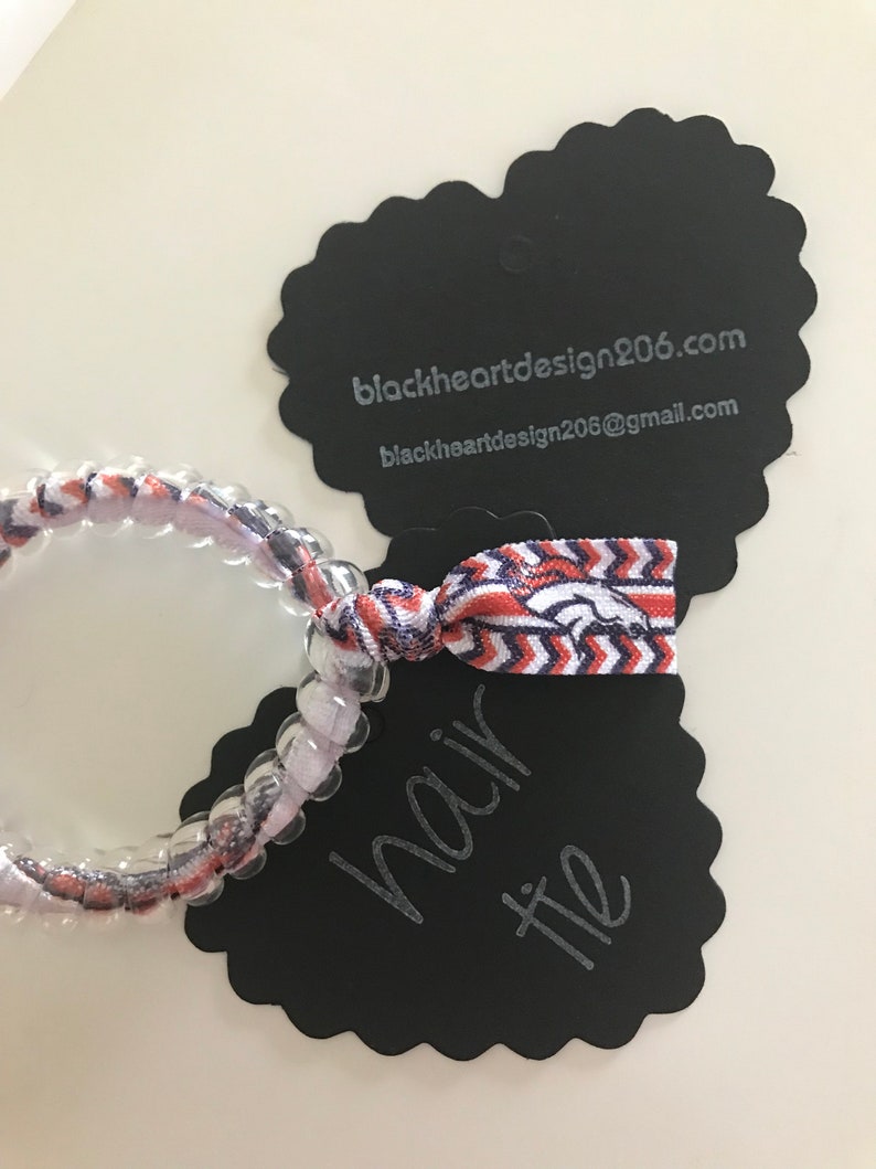 Denver Broncos football Secure sports hair tie hair cord hair elastic for all pony tail types messy buns.