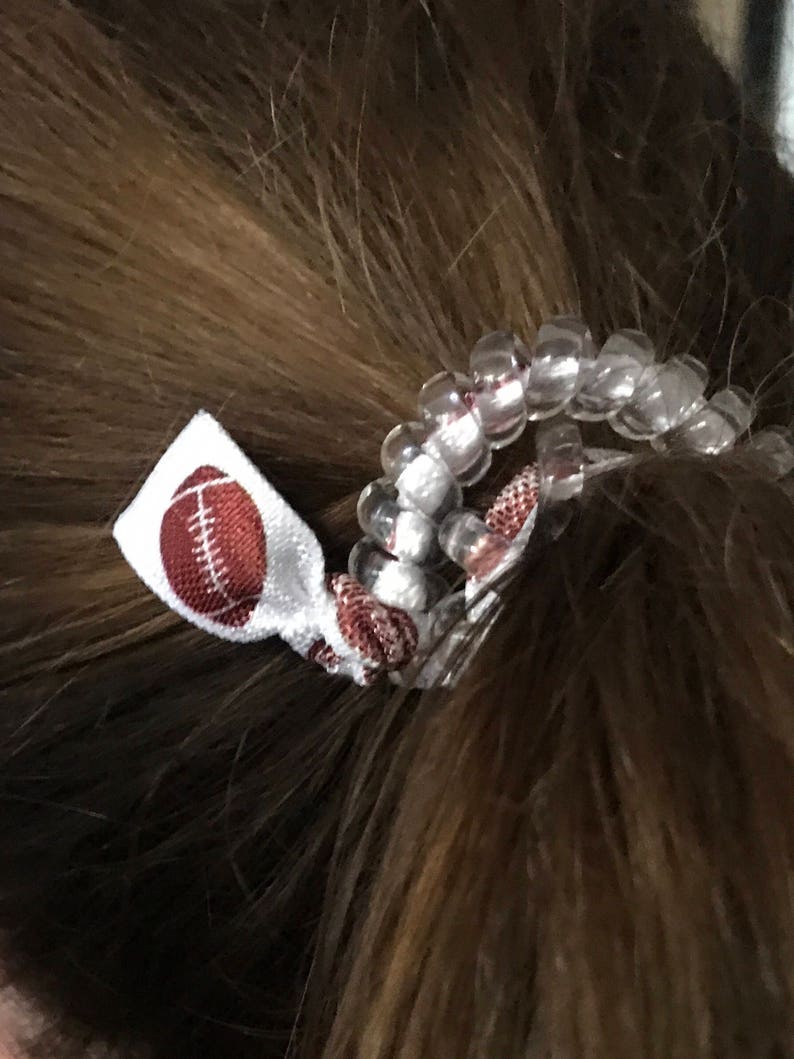 Denver Broncos football Secure sports hair tie hair cord hair elastic for all pony tail types messy buns.