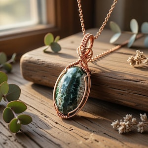 Handmade copper wire-wrapped moss jasper teardrop pendant with vibrant green dendritic patterns. Free 18" copper chain + luxury gift box.