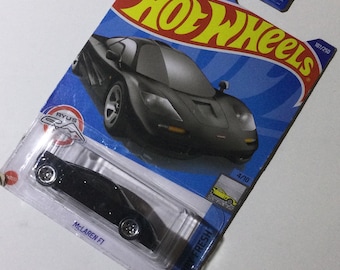 Black McLaren F1 Hot Wheels 1/64th scale.  Hotwheels die cast metal car, 107/250