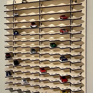 120 car hot new display case, diagonal shelves, tilted / flat hold 120 toy die cast cars. Show off your 1:64th scale wheels! Made in USA!